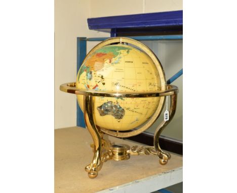 A TABLE TOP TERRESTRIAL GLOBE with hardstone effect inlays to represent the countries, supported by three cabriole legs with 