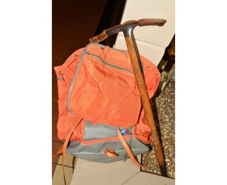 A VINTAGE STUBAI ASCHENBRENNER MOUNTAINEER'S ICE AXE, complete with wrist strap, together with a Serval orange rucksack (2)