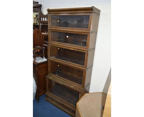 AN OAK GLOBE WERNICKE FIVE SECTION BOOKCASE with glazed fall front doors, approximate width 87cm x depth 36cm x height 189cm