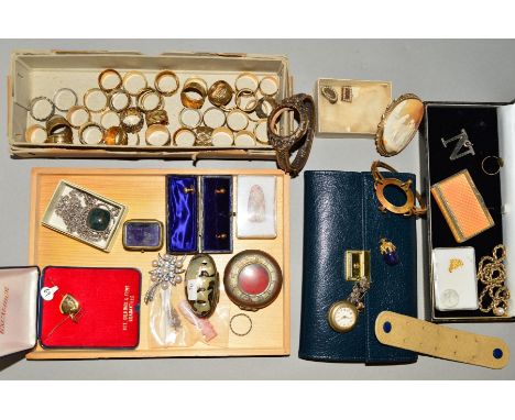 A LARGE QUANTITY OF ASSORTED COSTUME JEWELLERY ITEMS to include a vintage watch bangle case, a large shell cameo brooch depic