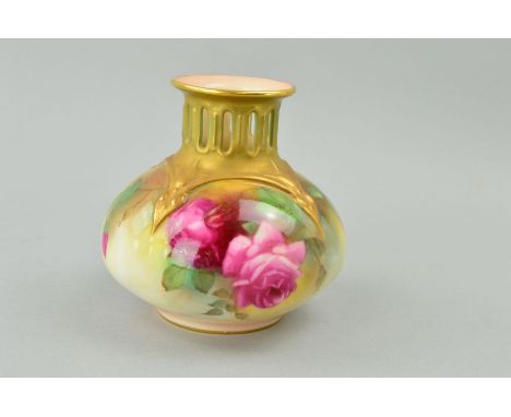 A ROYAL WORCESTER GLOBULAR VASE, with pierced neck and flared rim, painted with roses, puce backstamp and shape No.H.306, hei