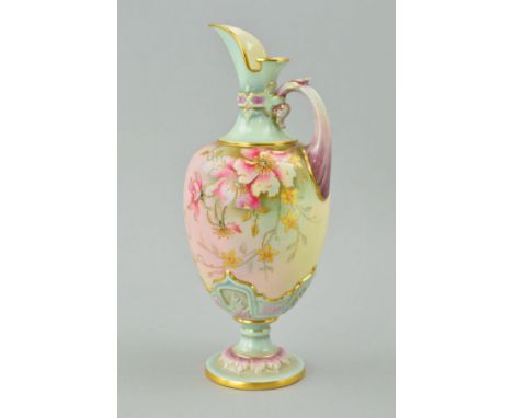 A ROYAL WORCESTER PEDESTAL EWER, shape No 1581, florally decorated with gilt edging, puce backstamp and Rd No189077, approxim