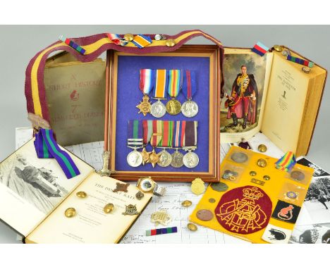 A FAMILY (FATHER AND SON) WWI AND WWII GROUP OF MEDALS, with extensive paperwork, copy photographs, etc, framed group of meda