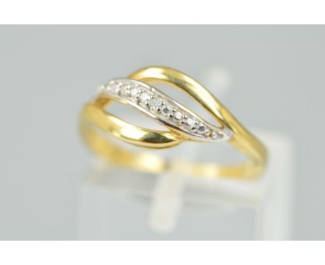 A 9CT GOLD DIAMOND DRESS RING, designed as three curved lines, the central line set with four single cut diamonds, estimated 