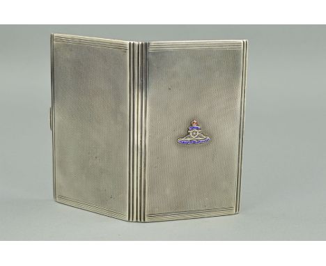 A SILVER CIGARETTE CASE, engine turned with Royal Regiment of Artilllery enamelled emblem to the centre on one side, measurin