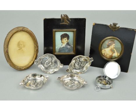 A SET OF FOUR DUTCH ASHTRAYS, cast in relief with a figure lighting a pipe, stamped 'GERO 90', together with a compass, two 2