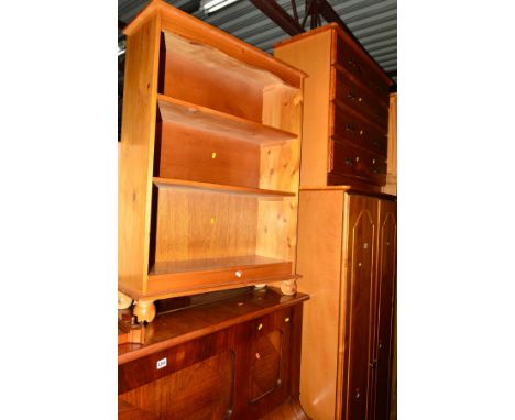 A PINE DOUBLE DOOR WARDROBE,  a pine chest of four long drawers, a pine open bookcase, a boxed globe and three table lamps  (