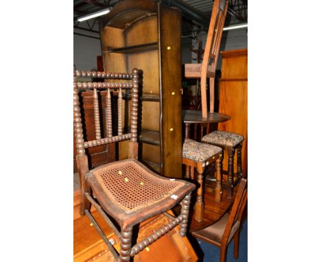 AN OAK BOBBIN TURNED CANE SEATED CHAIR, two stools and an open bookcase (4)
