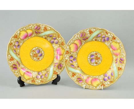 TWO ROYAL WORCESTER CABINET PLATES, fruit decorated with gilt overlay, puce backstamp and No.1734, diameters 22.5cm (2)