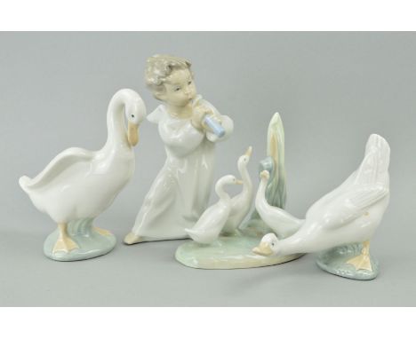 A LLADRO CHERUB PLAYING MUSICAL INSTRUMENT, height 16cm, together with three Nao duck figures/group (figure group with chippe