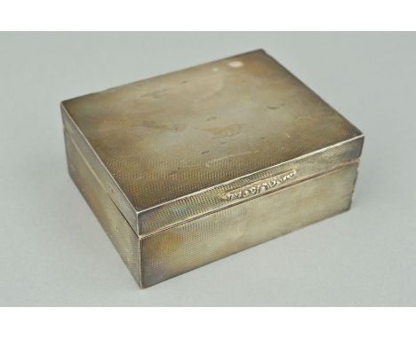 AN ELIZABETH II RECTANGULAR CIGARETTE BOX, engine turned decoration, Birmingham 1959, width 11.5cm x depth 9cm x height 4.5cm