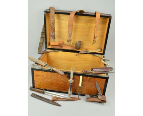 A LARGE WOODEN CHEST CONTAINING A NUMBER OF MILITARY AND OUTDOOR KNIVES, etc, including a German WWII era 'Erfurt' rifle bayo