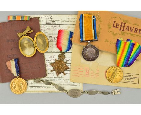 A WWI 1914-15 STAR TRIO OF MEDALS, together with an ID bracelet, locket and paperwork all relating to a soldier of the Great 