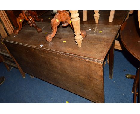 A GEORGIAN OAK GATE LEG TABLE together with a set of six stripped mahogany chairs (no seat pads) (7)