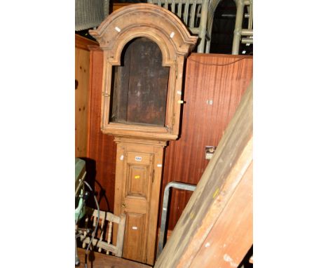 A RECTANGULAR STAINED PINE FOLDING TABLE, together with a beech longcase clock carcase (2)