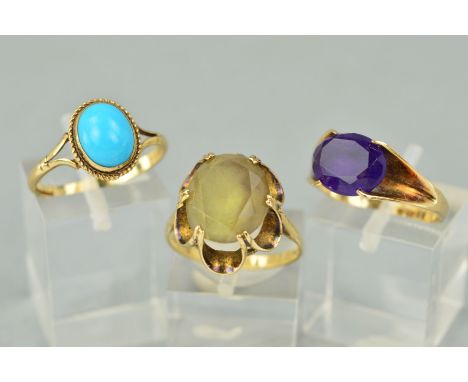 THREE 9CT GOLD GEM SET RINGS, the first designed as an oval amethyst within a four claw setting to the v-shaped shoulders, th