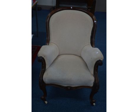 AN EARLY VICTORIAN MAHOGANY PARLOUR ARMCHAIR on ceramic casters (sd)