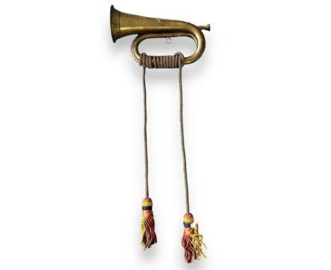 Bugle with The Welch cap badge and shoulder title and rank crown affixed. Alongside plaque named to 94664 R. Jones, further s