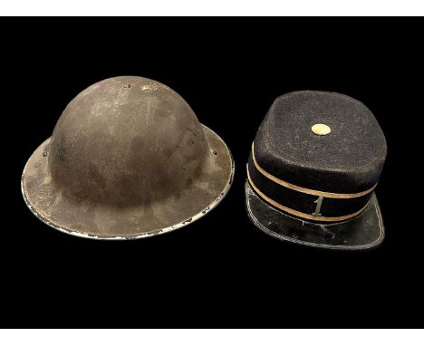 Second World War / WWII Brodie Helmet, marked for 1943, with internals and chin strap. Plus a boys brigade kepi. (2)