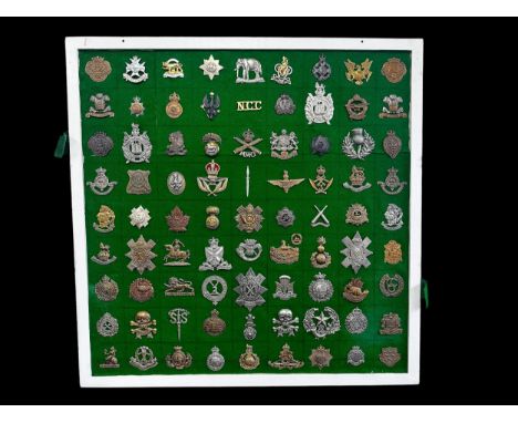 Cap Badges, organised range of well-presented cap badges, some better to include; 27th Lancers, Wigan Corps, Irish Guards, 19