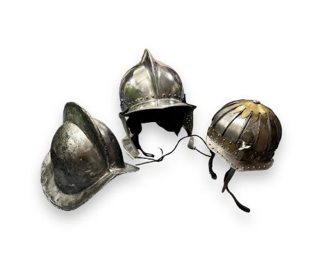 Three Reproduction Medieval Helmets. A Morion helmet made from metal. Polish hussar helmet, made from metal. Spanish helmet, 