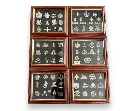 Cap Badges, collection of cap badges in six display frames, to include; Lancashire Hussars, Royal Corps of Signals, Middlesex