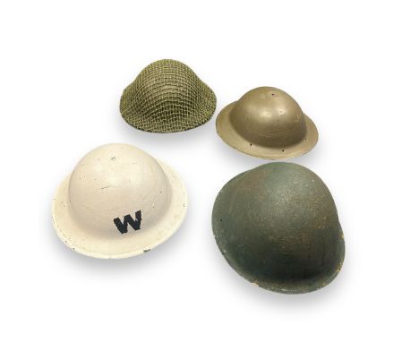 Four Re-enactment Military Tin Helmets. A white warden helmet, MKII helmet, Helmet with camo net, Brodie helmet. Qty 4.