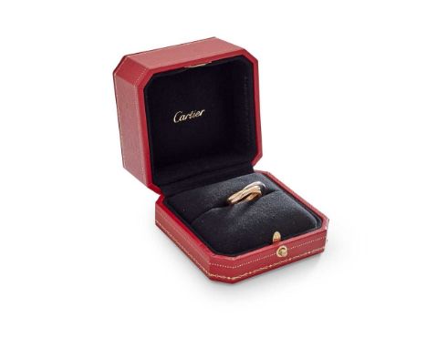 composed of three interlocking yellow, white and rose gold bands, signed Cartier, stamped AU750, numbered KNZ524, with origin