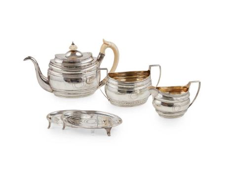 Burrows, London 1801/1802, comprising teapot and stand, twin handled sugar basin and milk jug, all of oval form, bright-cut e