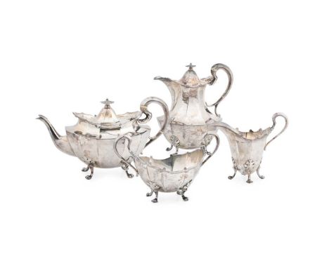 R &amp; W Sorley, Glasgow 1913, comprising waterpot, teapot, twin handled sugar basin and milk jug, all of oval panelled form