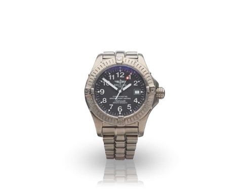 Avenger Seawolf model number E17370, titanium case, automatic movement, round black dial with raised Arabic numerals in white