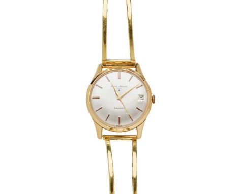 case marked 18K 750 to the interior, signed Baumatic automatic movement, signed round silvered dial with applied gold baton h