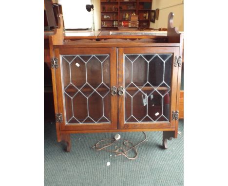 A Wall Mounting Oak Glazed Shelf Cabinet.