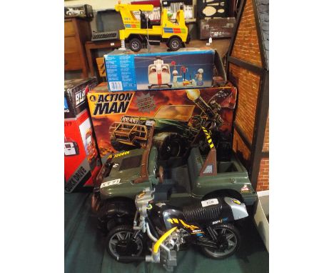 An Action Man 4x4 Jeep, Action Man Motorcycle and Playmobil Helicopter and Crane.