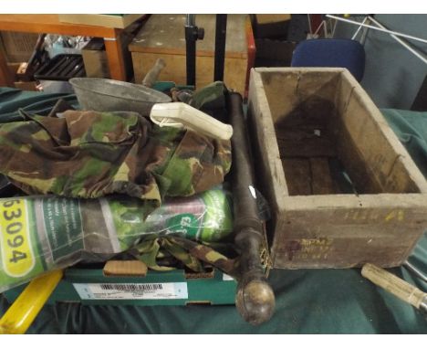 A Box of Tools and Army Camouflage. 
