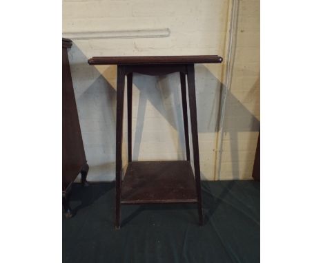 An Edwardian Square Topped Mahogany Occasional Table with Stretcher Shelf.