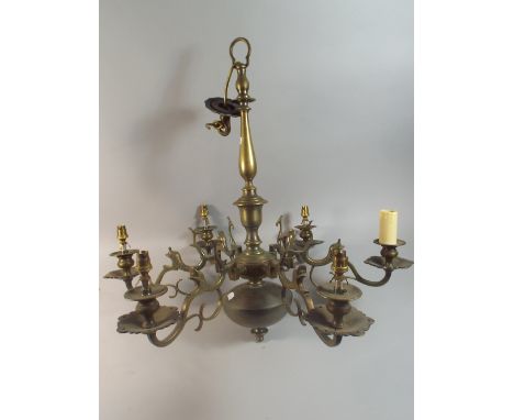 A Heavy Brass Six Branch Ceiling Chandelier with Dolphin Decoration.