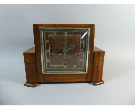 An Art Deco Walnut Westminster Chime Mantle clock