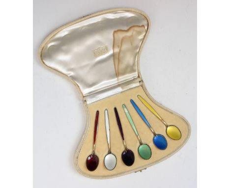 A cased set of David Anderson silver gilt enamel spoons, the teaspoons in various colourways with enamel to stem and bowl, re