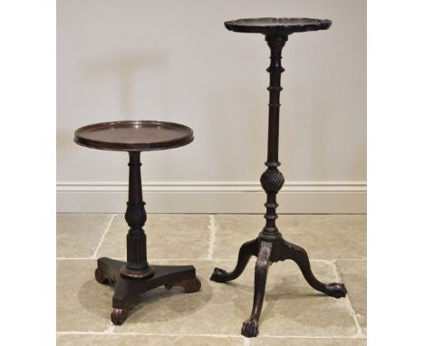 A Victorian rosewood wine/lamp table, the circular top with a moulded raised rim, upon a fluted, acanthus tapering column, tr