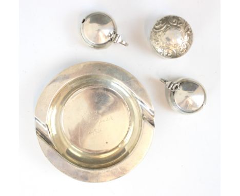 A George V silver ashtray, William Neale and Son, Birmingham 1936, the circular plain polished ashtray with two cigarette res