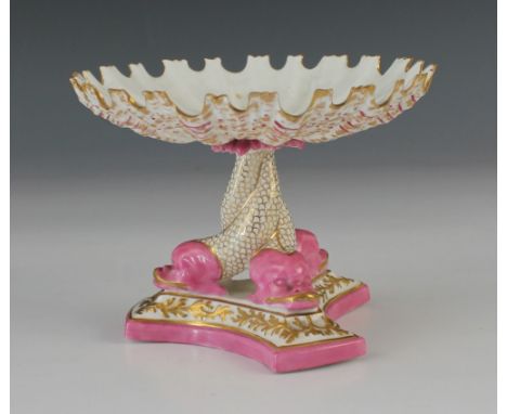 A Royal Worcester style dolphin comport of small proportions, late 19th/early 20th century, modelled as three dolphins suppor