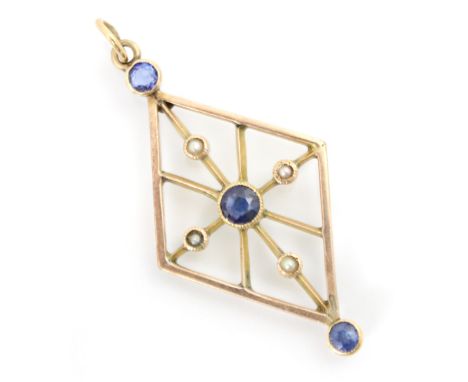 A 20th century untested sapphire pendant, the openwork lozenge shaped pendant set with central round cut blue stone within se