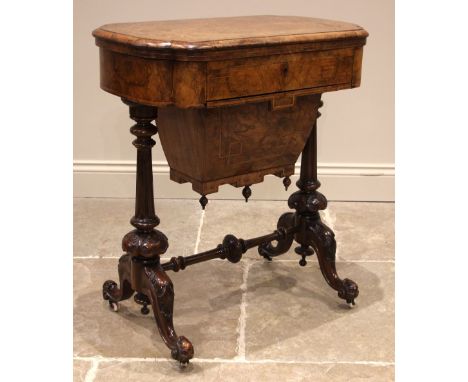 A Victorian burr walnut games/work table, the quarter veneered and marquetry inlaid hinged top, opening to a chess board and 