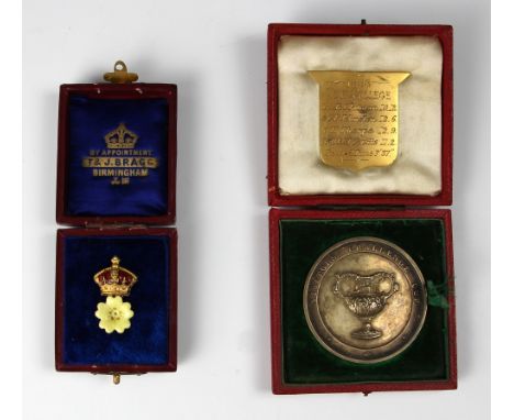 A 1898 new college 'Visitors Challenge Cup' rowers medal, in original fitted case with inscribed shield, 4.4cm wide, and an e