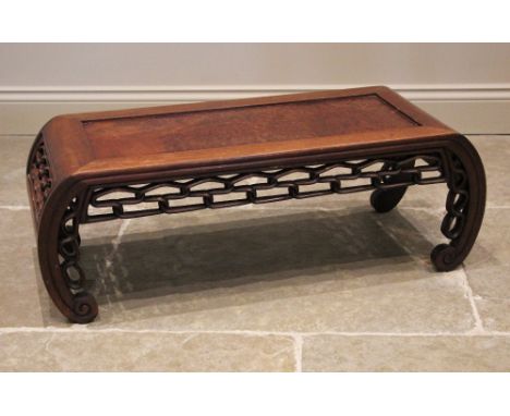 A Chinese hardwood opium table, early 20th century, the rectangular top inset with a panel, probably burr yew, upon curved an