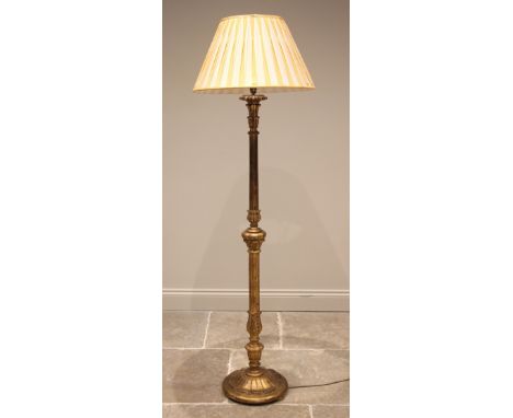 A Louis XV style giltwood standard lamp, mid 20th century, the fluted and acanthus moulded column extending to a circular pli