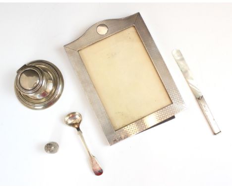 A selection of silver, including an Edwardian silver capstan inkwell, George Nathan &amp; Ridley Hayes, Chester 1908, 4.5cm h