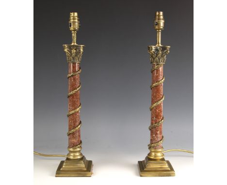 A pair of rouge marble and brass table lamps, probably Besselink & Jones, late 20th century, the marble Corinthian columns en