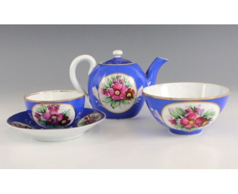 A Russian Gardner porcelain ladies part tea service, 18th century, comprising: a teapot and cover, a teacup and saucer, and a